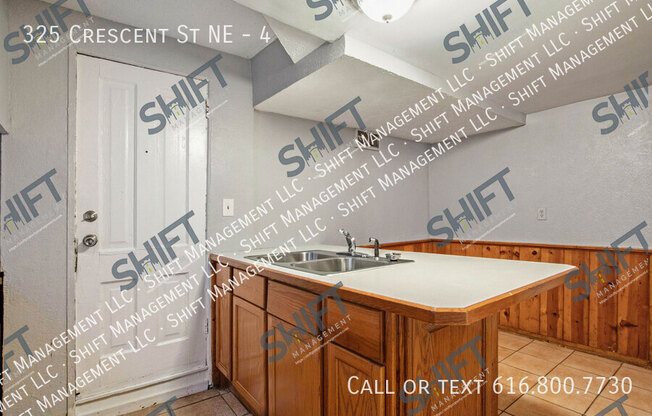 325 CRES ST NE