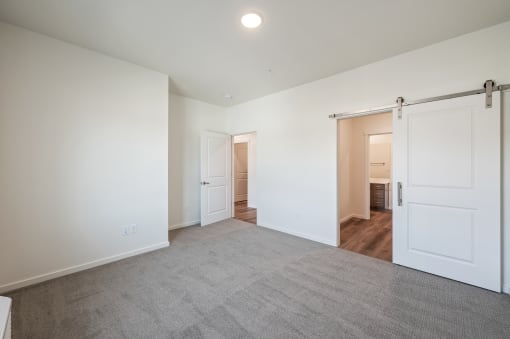 an empty living room with white walls and white doors at Gateway Apartments, East Wenatchee ,Washington, 98802