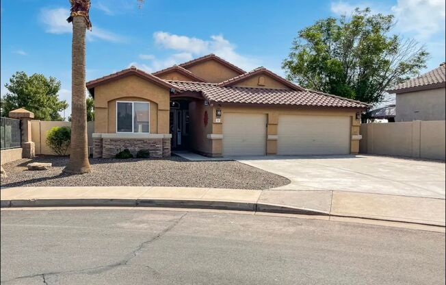 Gorgeous Furnished Single Level 3 Bedroom + 2 Bathroom + Den + 3 Car Garage + Pool + Golf Course Cul De Sac Lot in Greenfield Lakes in Gilbert