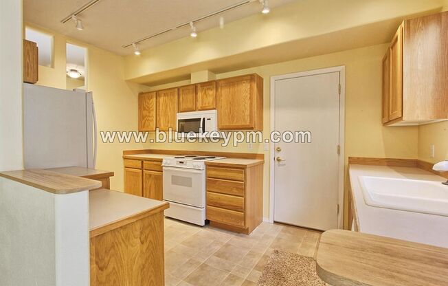 2 Bed, 2 Bath Main Floor Condo in Cascade Park with 2 Decks Near Columbia Square