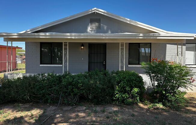 BEAUTIFULLY REMODELED 3 BEDROOM 1.5 BATHROOM HOME WITH A LARGE BACKYARD IN COOLIDGE