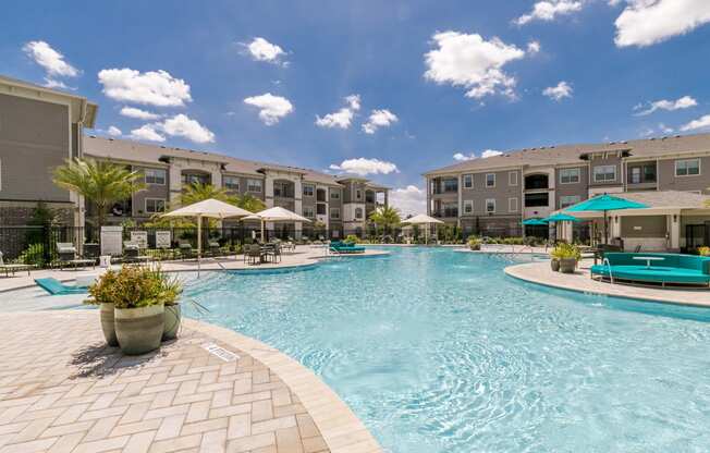 Outdoor Swimming Pool at Cue Luxury Apartments, Cypress, TX, 77433