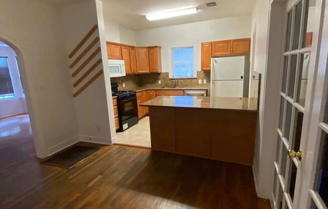 UT PRE-LEASE: Charming home 2 blocks from UT, Wood Floors, Updated kitchen, Walk/Bike to Campus