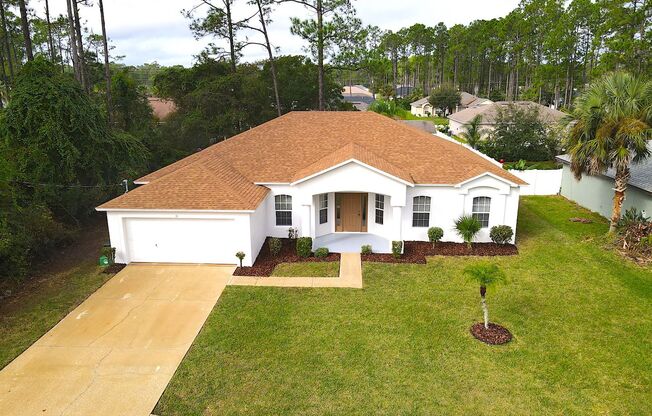 Spacious 4 Bed 2 Bath Home in Palm Coast w Fenced Yard!
