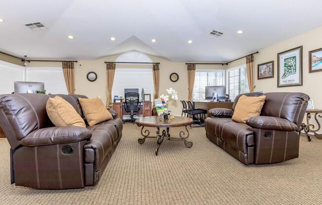 a living room filled with furniture and a tv