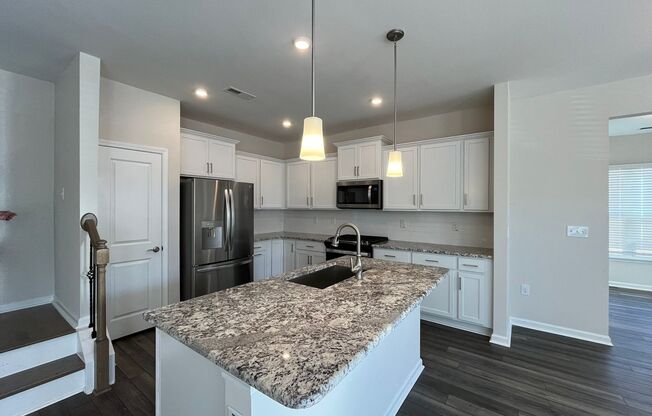 Newly Built 3BD, 2.5BA End Unit Durham Townhome with Attached 2-Car Garage in a Prime Location Near RDU Airport and RTP