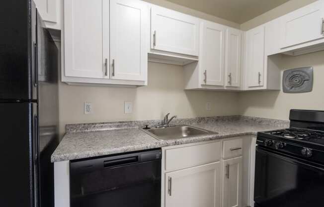 This is a photo of the kitchen in the 543 square foot B-style, 1 bedroom, 1 bath apartment at Blue Grass Manor Apartments in Erlanger, KY.
