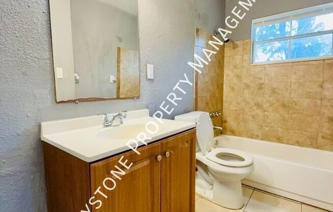 1409 E 108 AVE