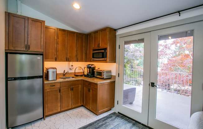 Clubhouse Kitchen at Townhouse in Renton WA Woodcliffe Apartment Homes