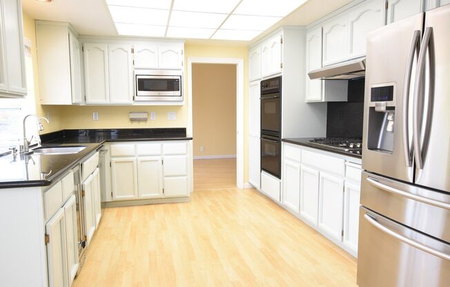 Beautiful 4 Bedroom 3 Bath Evergreen Home with Stunning Spacious Backyard!
