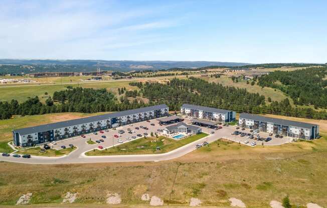 an aerial view of an office building and parking lot