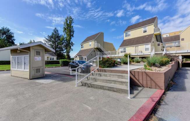 Community Mailbox area with small staircase leading to one of the buildings 