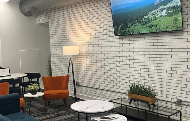 interior seating area with view of wall mounted tv at Residences at South High, Pittsburgh, 15203 ? 