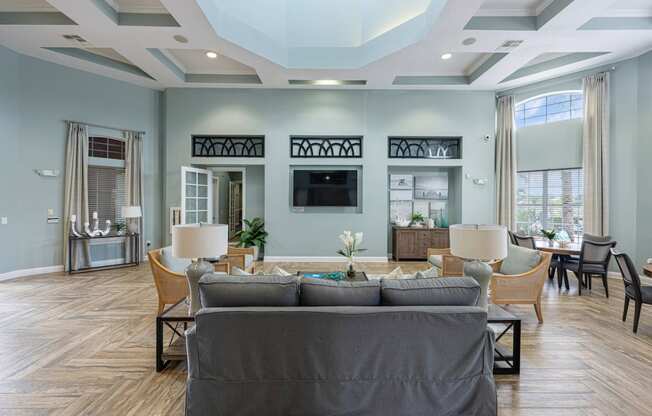 a living room with a couch and a tv