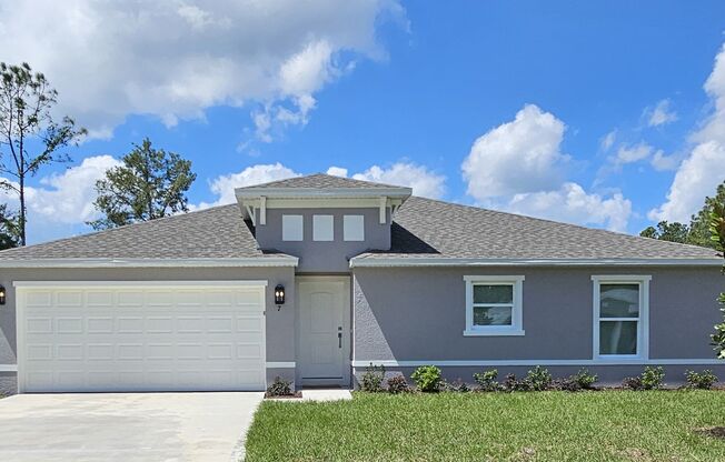 **$500 OFF THE 1ST MONTHS RENT!  STUNNING BRAND NEW 4/2 HOME IN PALM COAST
