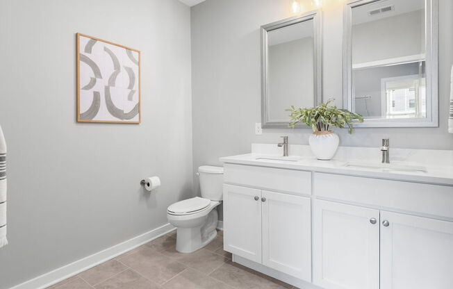 a bathroom with a toilet and a sink and a mirror at Madison Prickett Preserve, Yardley