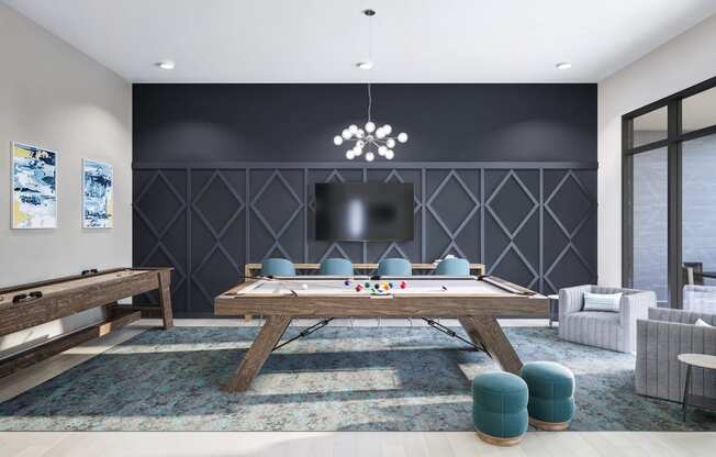 a game room with a pool table and a tv