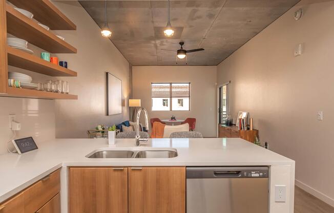 a kitchen with a sink and a refrigerator