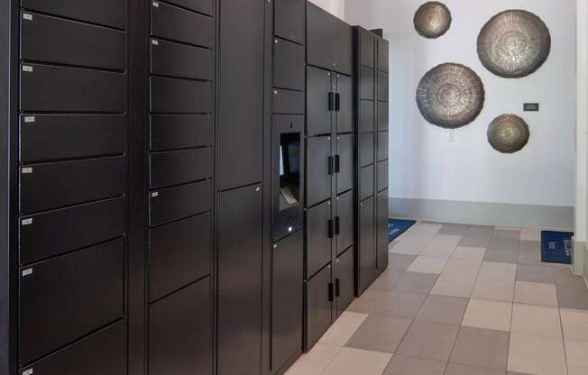 a row of lockers in a room with plates on the wall
