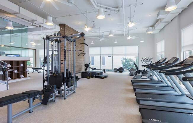 Fully equipped fitness center at The Rey Apartments, CA, 92101