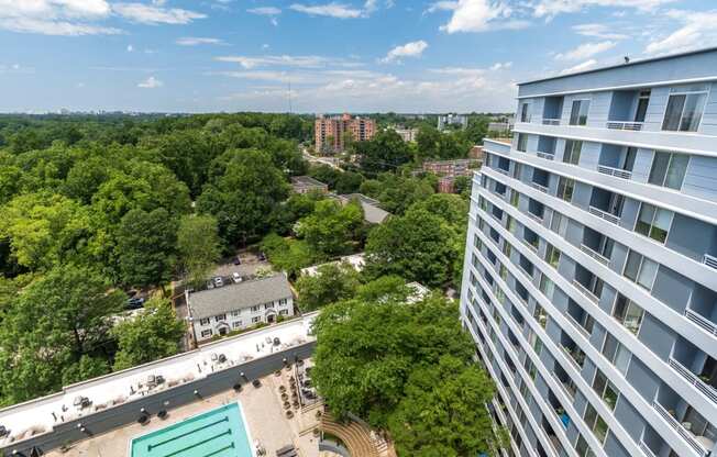 Building exterior and pool view at Lenox Park, Silver Spring