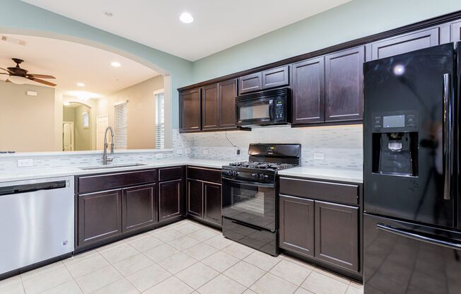 Spacious 4 Bed, 2.5 Bath Home with Fenced Yard & Garage – Comfort Meets Convenience!