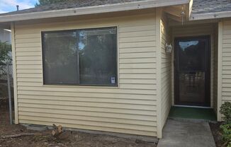 Centrally located 2 BR, 2 BA Duplex Unit with 1-car garage