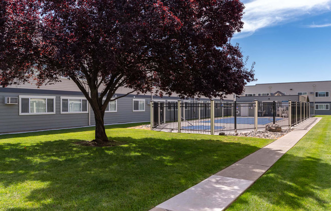 Americana | Outdoor Pool, Exterior Building and Walkway