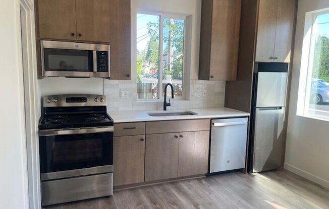 Delightful Modern Apartment in the Heart of Cully! Reach Out Today! Half Off Deposit & Waived Application Fee Upon Approval!