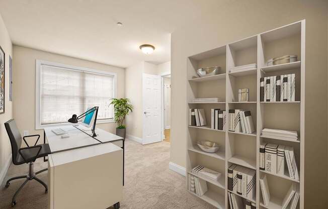 A room with a desk, chair, and bookshelf.