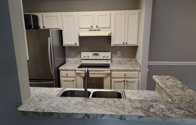 Beautiful 3 bedroom condo overlooking pool!