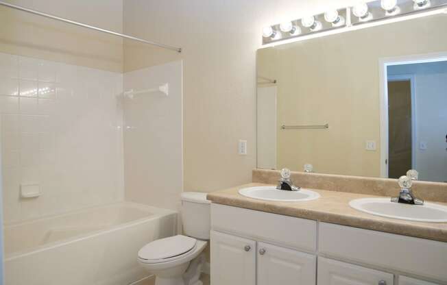 Interior Bathroom White Cabinets at Magnolia Place Apartment, Florida, 32606