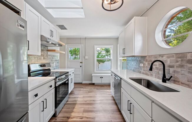 Fully Renovated Wheat Ridge Home | Fireplace + Bonus Living Space