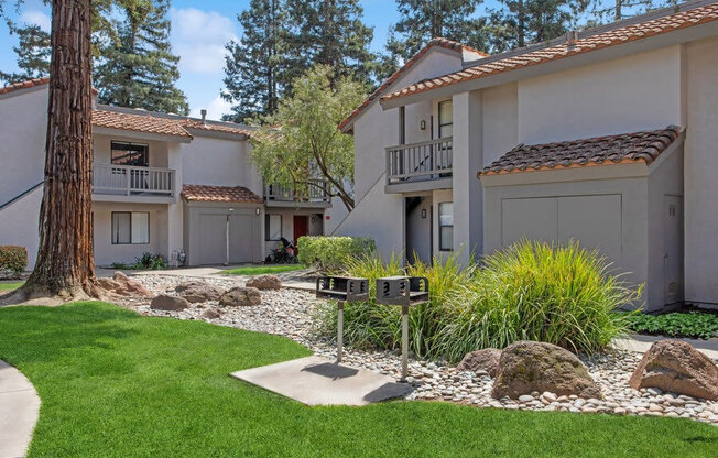Exterior Community Building and Landscape at Creek 2645 Apartments in Sacramento, CA.