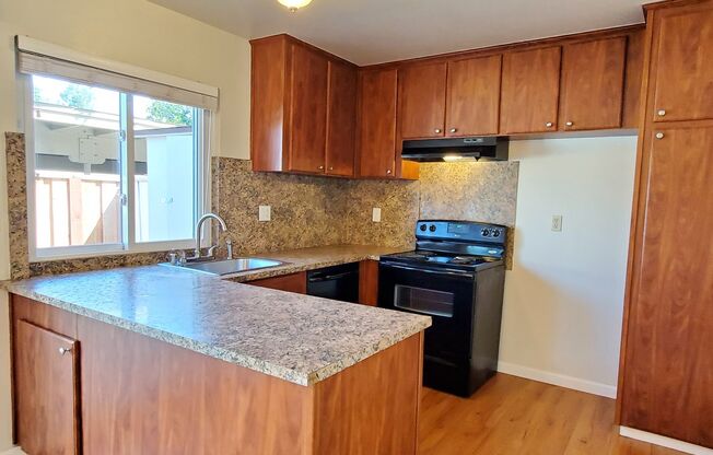 Spacious 2-Story Townhome, Fresh Paint, New Carpet, Wood Floor Downstairs, Patio, Dual Pane, Washer/Dryer Hookups!