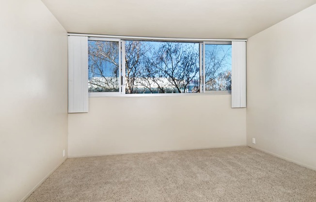 unfurnished bedroom with carpet flooring at Avenue Two Apartments, Redwood City  , California