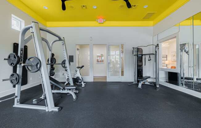 the gym at the heights at harpers preserve apartments