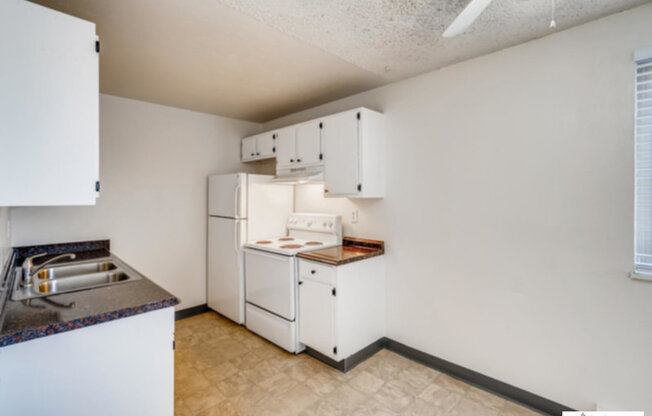 3660 S. Lowell Blvd. #303