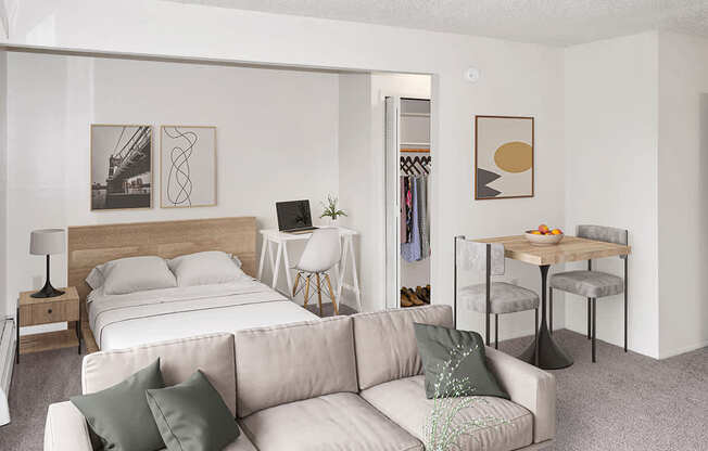 a living room with a sleeping area at Seville Apartments, Kalamazoo, 49009