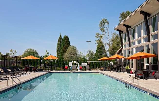 West End District Apartments in Beaverton, Oregon Pool with Lounge Chairs
