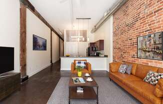 a living room with a couch and a coffee table