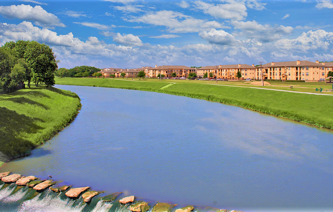 View of the Community from the Trinity River at The Canyons Apartments, Fort Worth, TX
