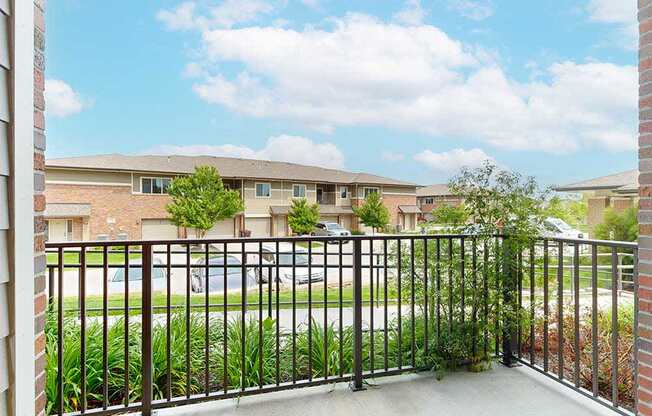 A view from the balcony of the neighboring homes, and the green spaces in the community.