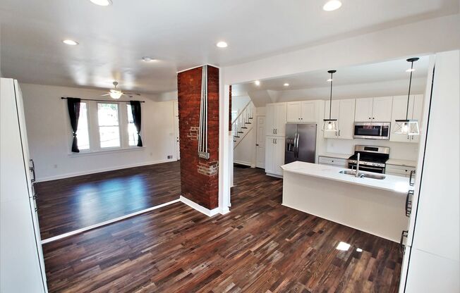 GORGEOUS, large 3 bedroom stand alone house w/ master suite, quartz, stainless, a/c, laundry, and parking!
