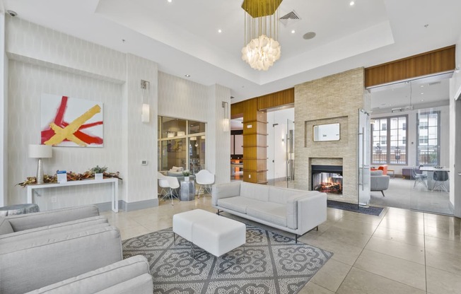 a living room filled with furniture and a fireplace  at Harbor Pointe, Bayonne
