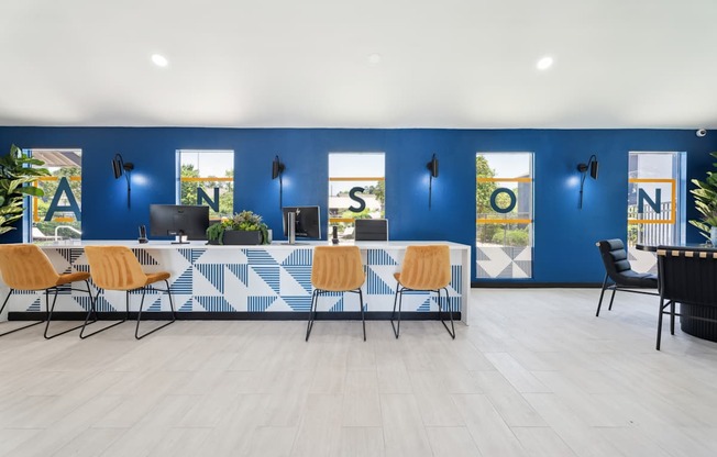 A conference room with a blue and white patterned table and chairs.