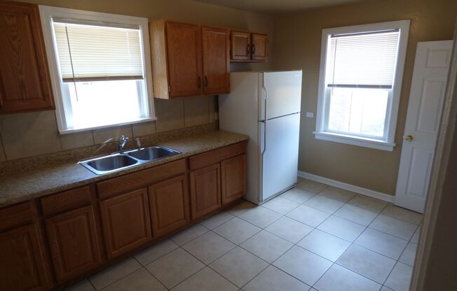 CHARMING RANCH STYLE HOME IN ELYRIA-SWANSEA WITH FENCED YARD AND GARAGE