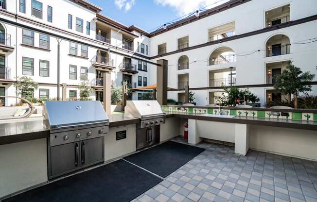 Santa Clara CA Apartments for Rent-Central Courtyard BBQ Area With Stainless Steel Grills