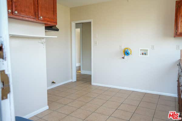 1353 W 49 ST