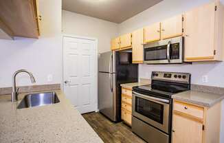 Spacious Kitchens with Upgraded Appliances  at Apartments Near Arrowhead Mall